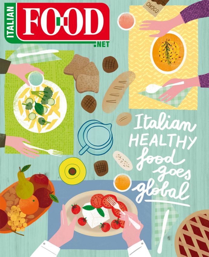 Italian Food .net magazine cover, 2017 issue. Healthy food goes global, featuring pasta, bread, and fruit.
