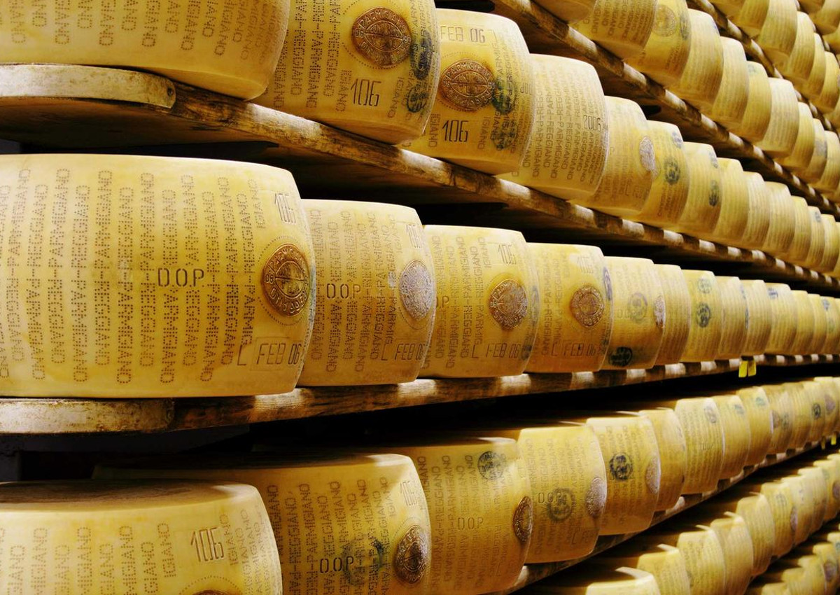 Ripe Parmigiano-Reggino Cheese Wheels Ready For Export Photograph