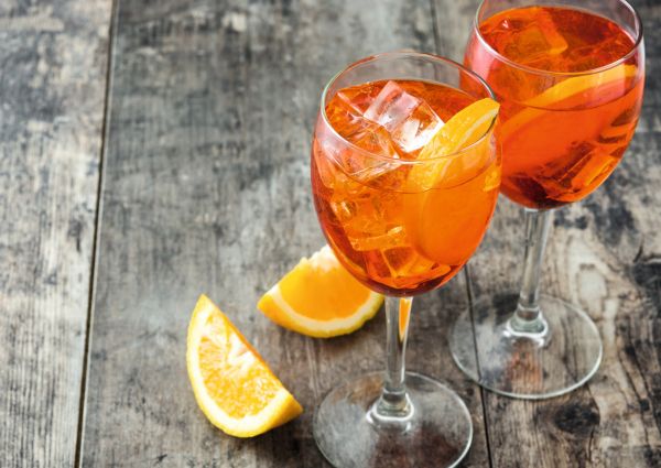 Aperol Spritz cocktails with orange slices. Veneto gastronomic tourism.