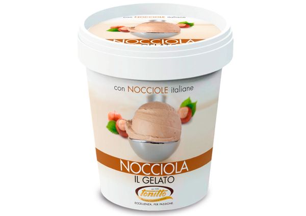 Tonitto Nocciola Gelato. Italian hazelnut ice cream in a white container. Delicious dessert.