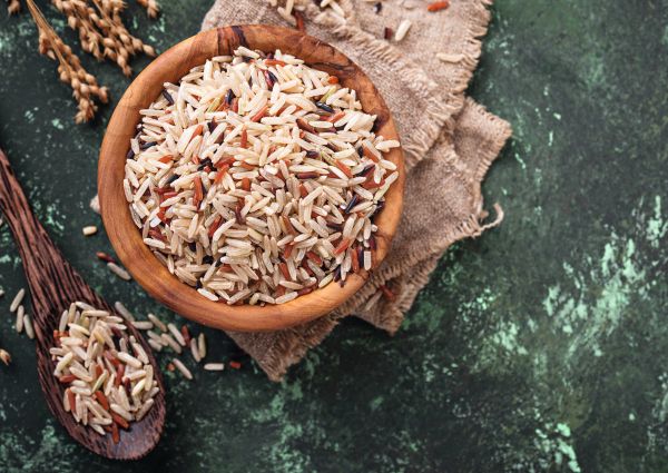 Mix of brown, red and wild rice in bow