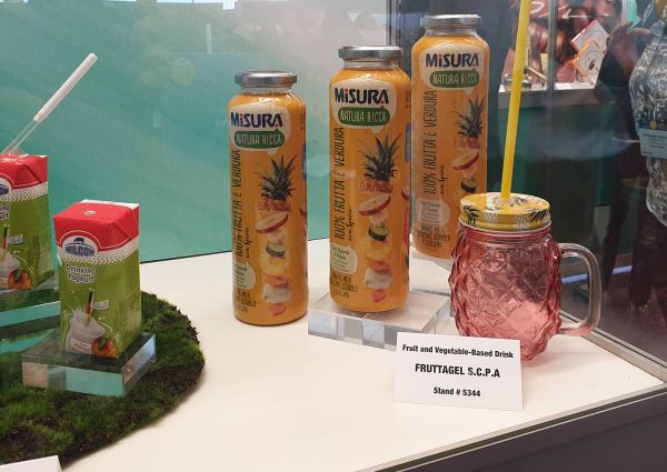 PLMA Idea Supermarket display of Italian Misura fruit and vegetable drinks and Milcow drinking yogurt.