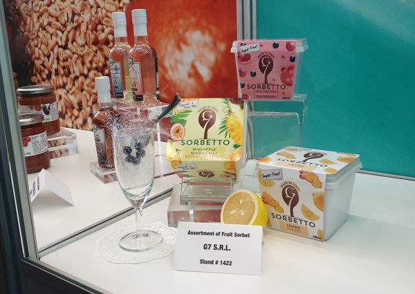 Italian food products: G7 S.R.L. fruit sorbet assortment at PLMA Idea Supermarket. Pineapple, mango, lemon, and pomegranate flavors.