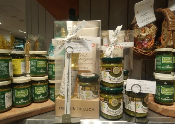 Italian F&B store display: Rummo pasta, Venturino pesto & EVO oil gift box, La Gallinara Salsa Verde jars.