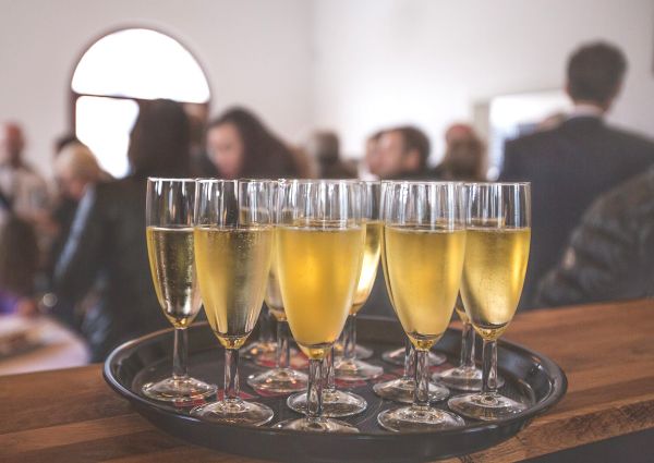 Tray of sparkling wine glasses. Italian Prosecco or Champagne served at an event.