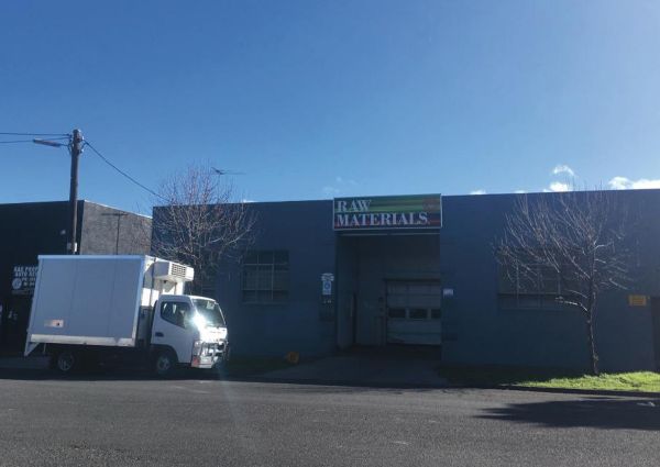 Raw Materials headquarters. Truck parked outside Italian food importer warehouse.