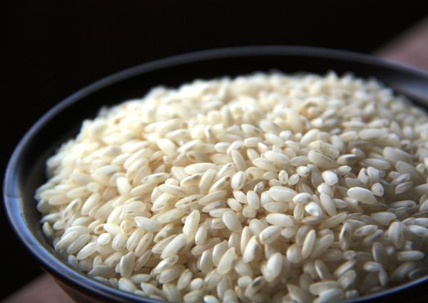 Close-up of Italian rice in a bowl. Image relates to Vietnam's impact on rice production.