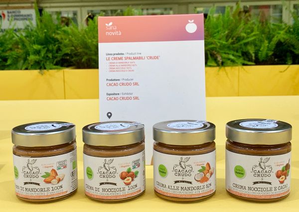 Italian Organic Food: Cacao Crudo SRL's organic nut creams at SANA 2019. Almond, hazelnut, and cocoa spreads.