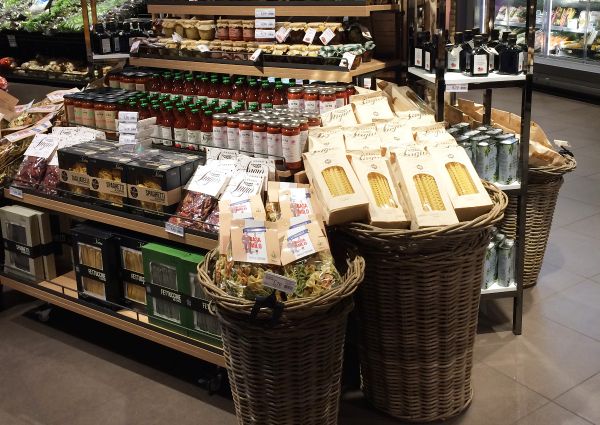 Migros Swiss store display of Atlante Italian food products. Pasta, sauces, and oils.