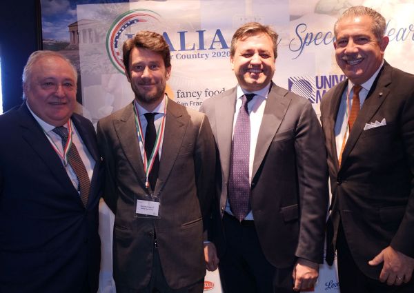 Italy at Fancy Food Show 2020. Group of men in suits pose at the Italian trade show.