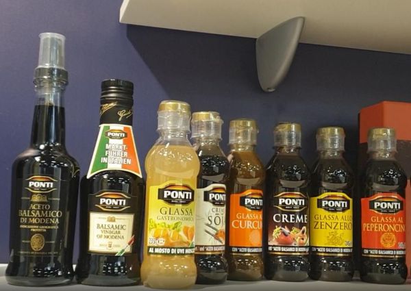 Ponti premium balsamic vinegar and glaze bottles. High-quality Italian condiments.