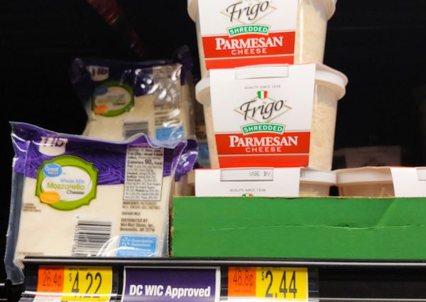 Walmart cheese aisle: Frigo shredded Parmesan, Great Value mozzarella cheese. Grocery shopping.