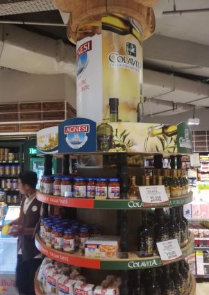 99 Ranch Market aisle with Colavita olive oil and Agnesi pasta sauces on display. Italian food products.