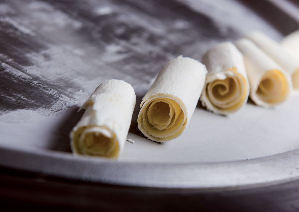Rolled Italian ice cream. Delicious, tech-inspired frozen dessert.