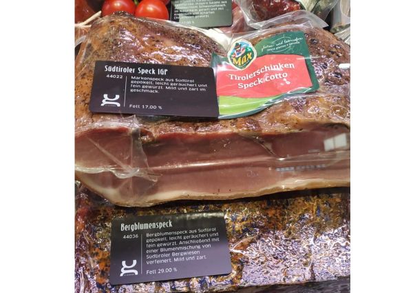Italian Cuisine: South Tyrolean Speck IGP and Tyrol Smoked Ham Speck Cotto, cured meats.
