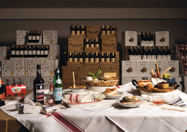 Italian cheese and wine selection in Australia. Montenegro liquor, San Pellegrino, and Barrakomba wine.