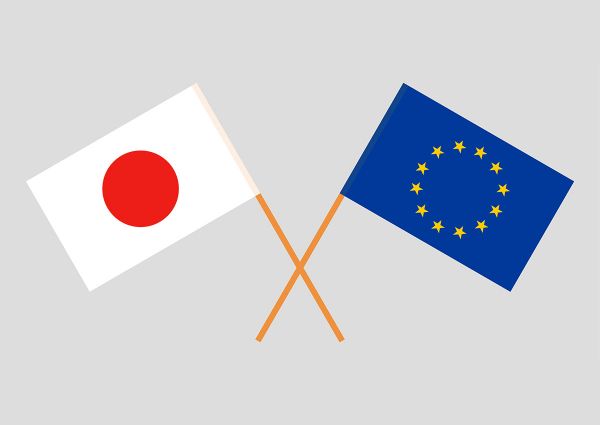 Japan and EU flags crossed. Japanese and European Union relations.
