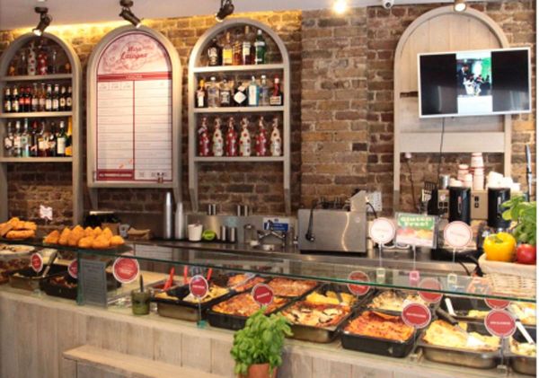 Mister Lasagna restaurant interior in London. Italian food, lasagna dishes, drinks, and menu on display.