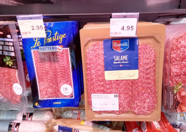 Rapelli Swiss salami at Denner Market in Switzerland. Packaged salami with price tags.