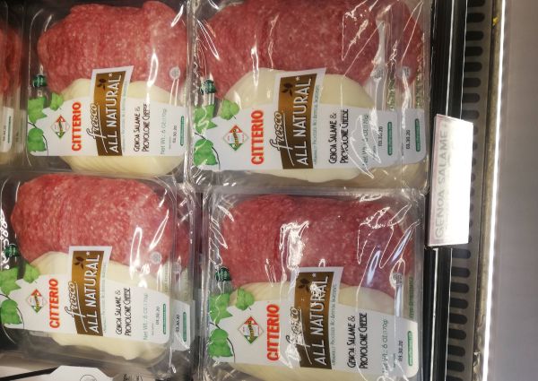Citterio Genoa salame and provolone cheese, Italian food at Trader Joe's. Cold cuts on shelves.