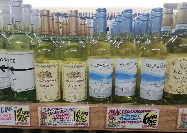 Italian Pinot Grigio wine selection at Trader Joe's. Brands include Santa Margherita and Mezzacorona.