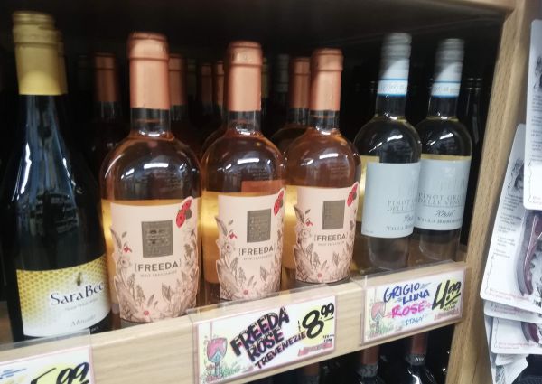 Italian rosé wines on display at Trader Joe's. Freeda Rosé Trevenezie, Sara Bee Moscato, and Grigio Luna Rosé.