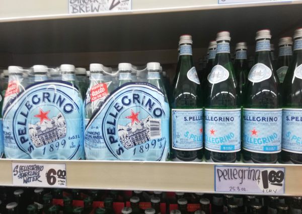 San Pellegrino Italian sparkling mineral water bottles on Trader Joe's shelves.