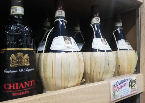 Trader Joe's Italian food: Chianti wine bottles on the shelves. D'Aquino Chianti Classico Riserva.