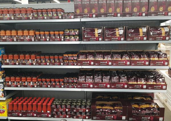 Walmart Canada's Fior Fiore Italian pasta, sauces, and products on shelves. Grocery shopping.