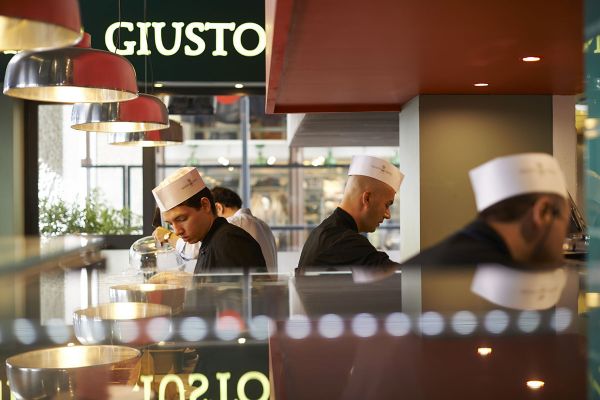 Panino Giusto chefs at work. Italian sandwiches being prepared in San Babila, Milan.