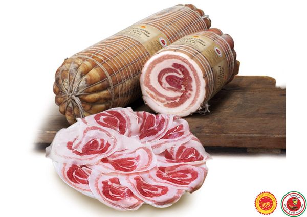 Salumi Piacentini PDO: Rolled pancetta and sliced cured meat. Italian delicatessen.