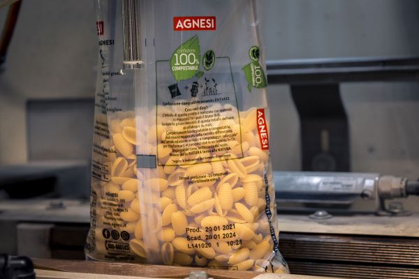 Agnesi pasta in 100% compostable pack. Italian pasta brand Colussi launches eco-friendly packaging. Sustainable food packaging.
