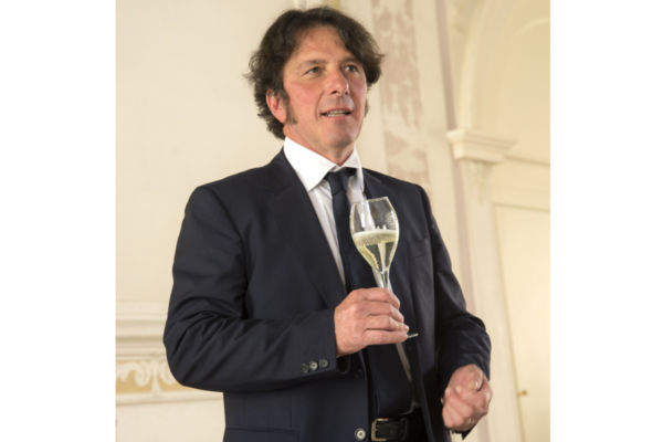 President Zanette toasts China's Prosecco DOC wine recognition with a glass of sparkling wine.