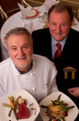 Vincenzo's Italian Restaurant owners Agostino and Vincenzo Gabriele with plated dishes. Louisville staple.