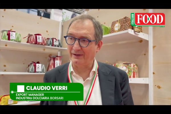 Claudio Verri, Export Manager, Industria Dolciaria Borsari, with Muzzi Panettone Christmas cakes in the background.