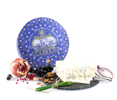 Granarolo Gorgonzola cheese still life with fruit and nuts. Italian Food Awards 2022 finalist.