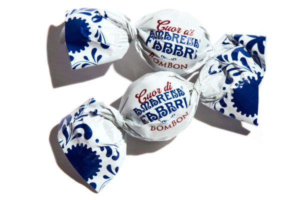 Fabbri pralines. Wrapped Cuor di Amarena Bombon candy with blue floral design. Italian confectionery.