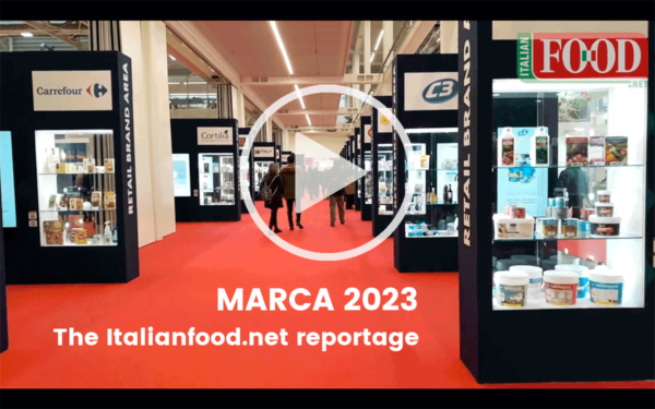 Italianfood.net's Marca 2023 reportage. Retail brand area with food products on display. Trade show.