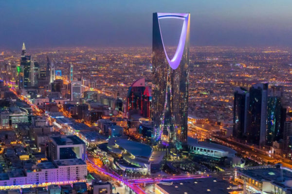 Riyadh, Saudi Arabia skyline at night. Kingdom Centre Tower. No-alcohol drinks market.