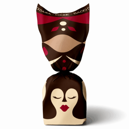 Bacio di Dama cookie finalist in the Italian Food Awards USA, wrapped in decorative packaging with a stylized face.